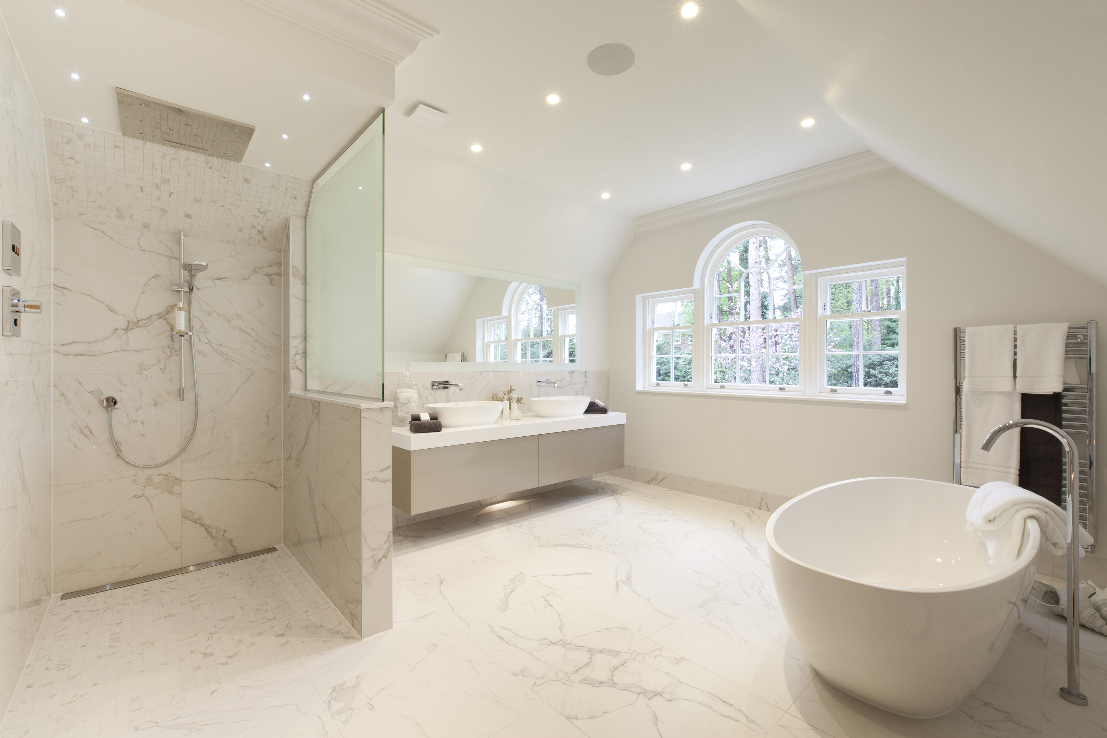 luxury ensuite wetroom with well placed mirror