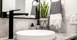Dark matte tap stem with white wash basin