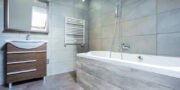 Stone coloured bathroom with tiles