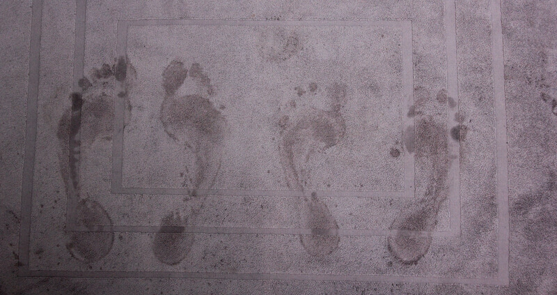 Bathroom mat with feet imprints