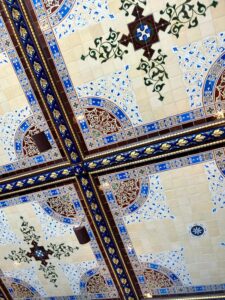 Beautiful tile ceiling with cream, blue, and brown details