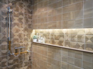 Shower-bathroom corner with shower and side shelf