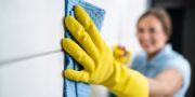 Grout tile cleaning. Cleaning wall with wipe