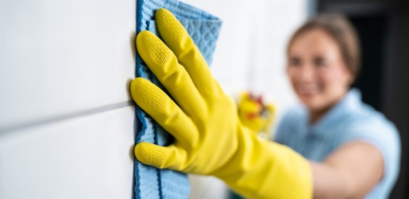 Grout tile cleaning. Cleaning wall with wipe